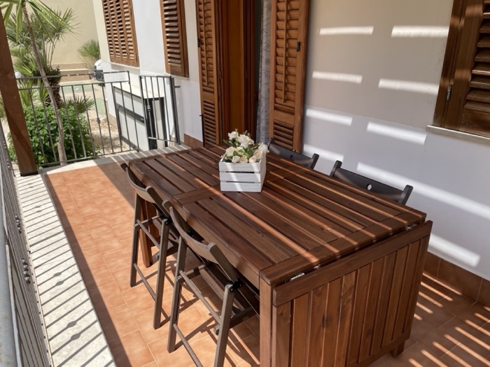 Terrazza privata con tavolo da pranzo